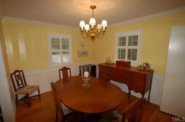 3213 Oak Grove Circle Raleigh, NC 27607 - Photo 3 of 10 a view of a dining room with furniture and window
