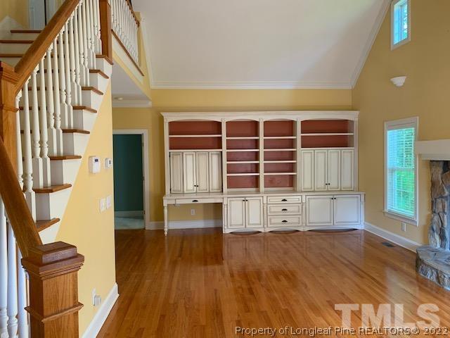 418 Summers Walk Circle Garner, NC 27529 - Photo 3 of 17 a view of empty room with wooden floor and fan