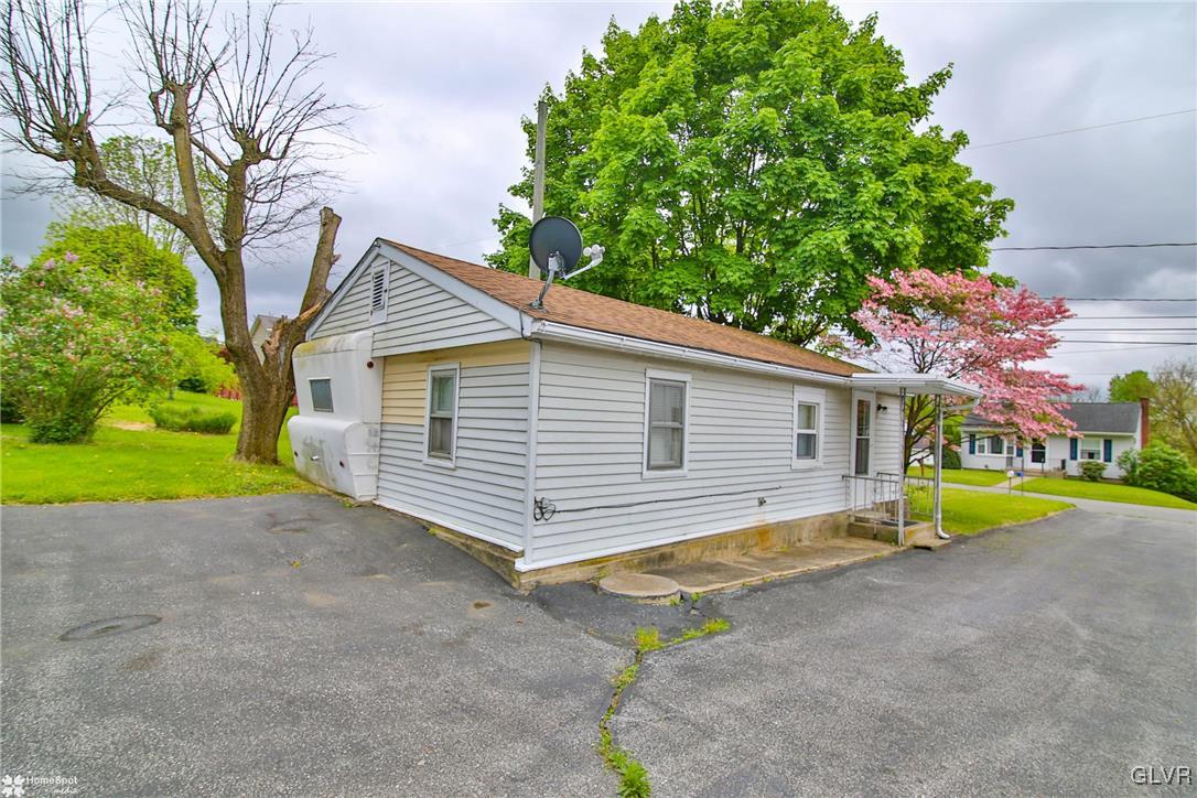 491 Sportsman Club Road Nazareth, PA 18064 - Photo 15 of 25 a view of a house with a yard and potted plants