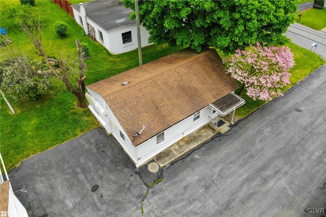 491 Sportsman Club Road Nazareth, PA 18064 - Photo 23 of 25 an aerial view of a house with a yard and a garage