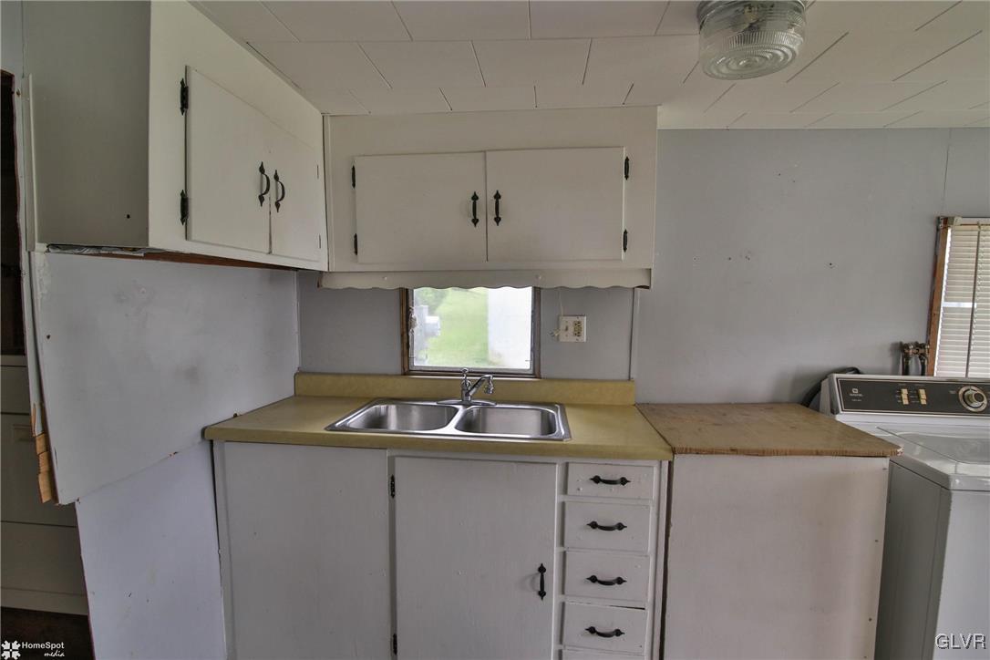 491 Sportsman Club Road Nazareth, PA 18064 - Photo 8 of 25 a kitchen with cabinets appliances and a sink