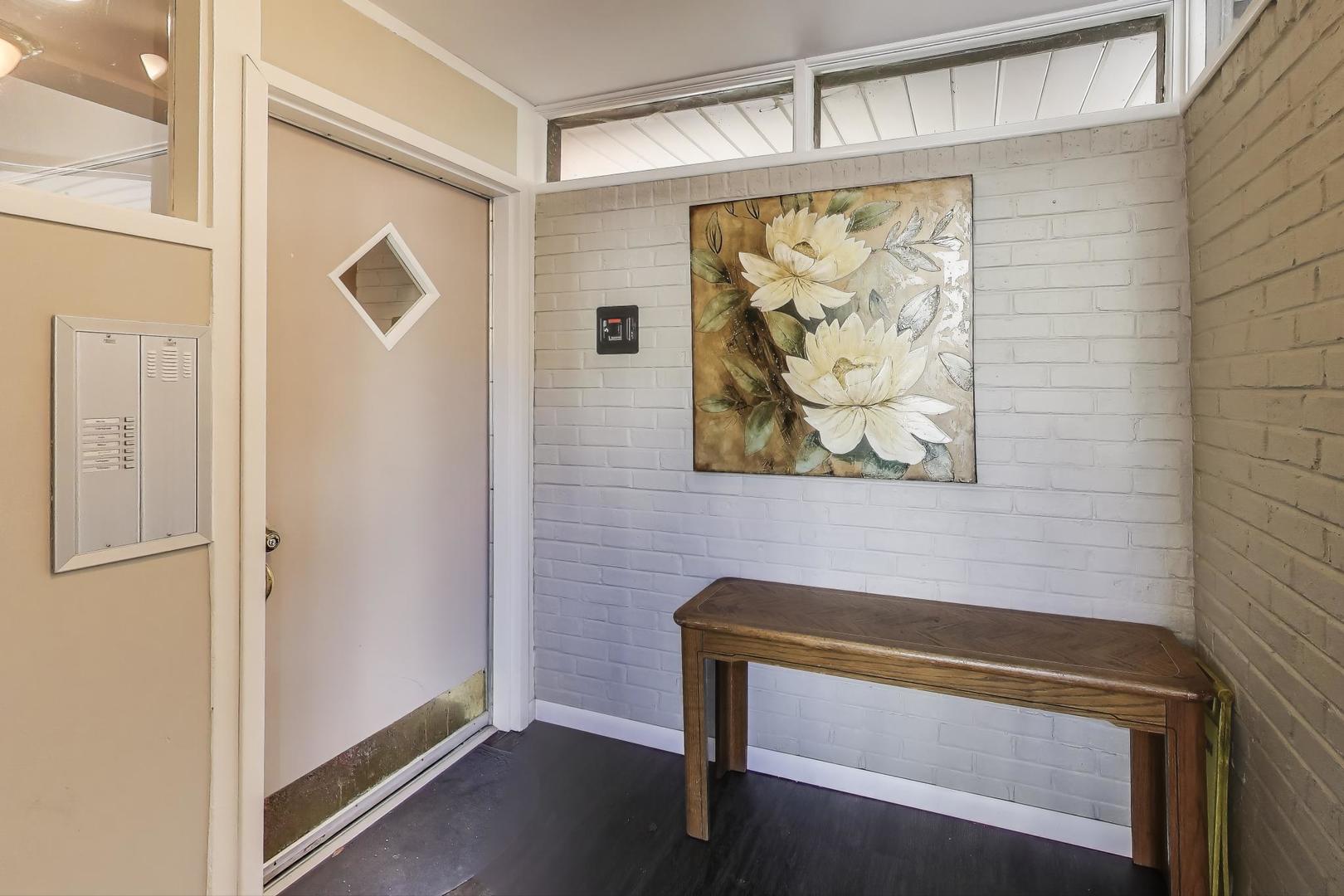 1847 Tanglewood Drive, Unit 2B Glenview, IL 60025 - Photo 25 of 26 a view of bench