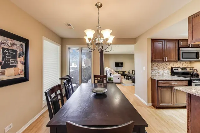 a view of a kitchen and dining room