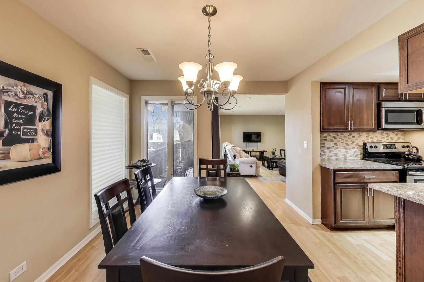 1847 Tanglewood Drive, Unit 2B Glenview, IL 60025 - Photo 8 of 26 a view of a kitchen and dining room