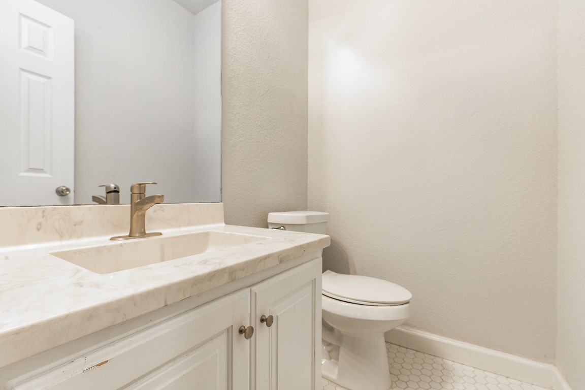 2204 San Gabriel Street, Unit 104 Austin, TX 78705 - Photo 7 of 18 Bathroom featuring vanity and tile patterned flooring