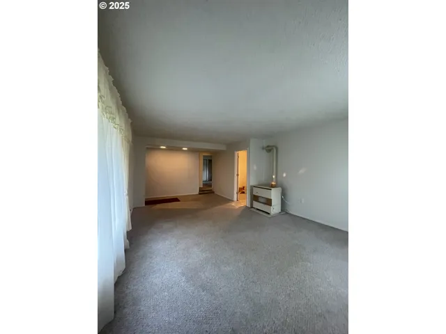 a view of a room with a garage