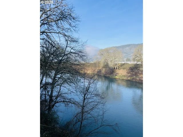 a view of a lake from a hallway