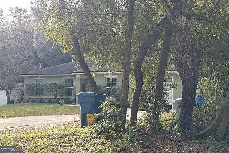 1340 West New York Avenue Orange City, FL 32763 - Photo 2 of 5 a view of a garden