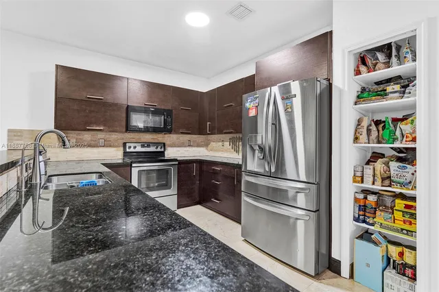 $880,000 | 9770 Northwest 10th Street, Miami, FL 33172