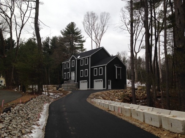 2 Cold Spring Brook Road Hopkinton, MA 01748 - Photo 3 of 20 a view of a house with a yard covered in snow
