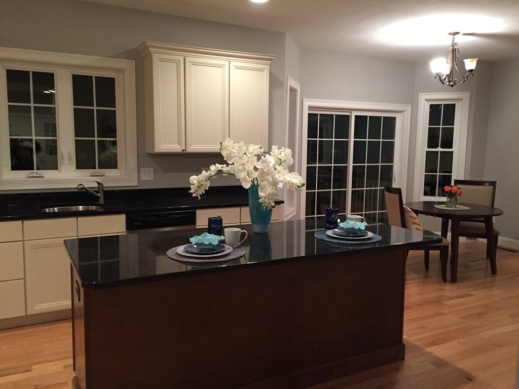 2 Cold Spring Brook Road Hopkinton, MA 01748 - Photo 4 of 20 a kitchen with a table and chairs in it