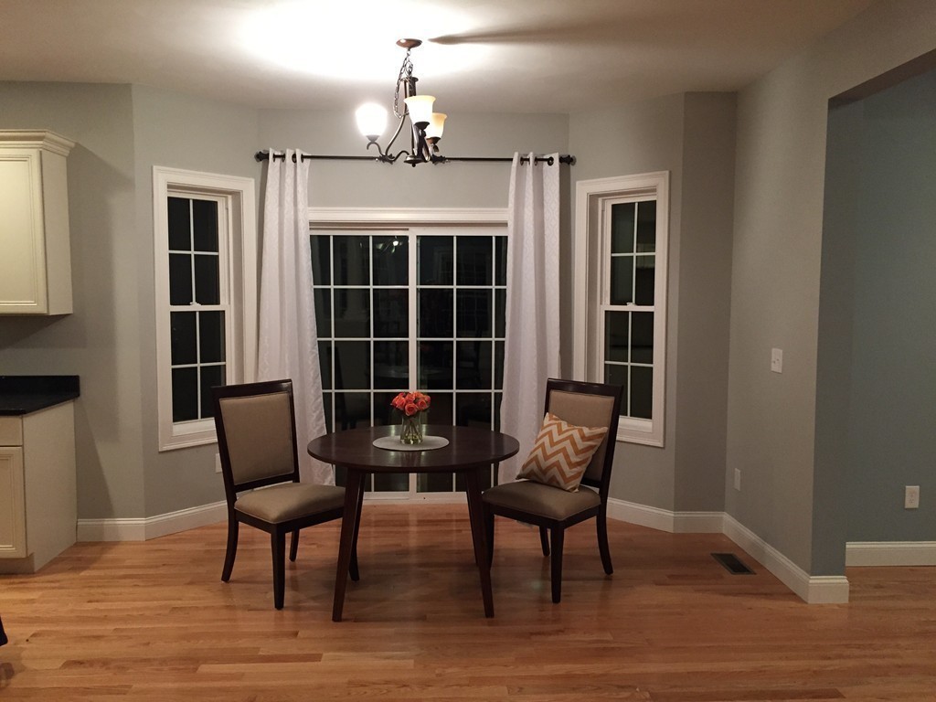 2 Cold Spring Brook Road Hopkinton, MA 01748 - Photo 9 of 20 a view of a livingroom with furniture and wooden floor