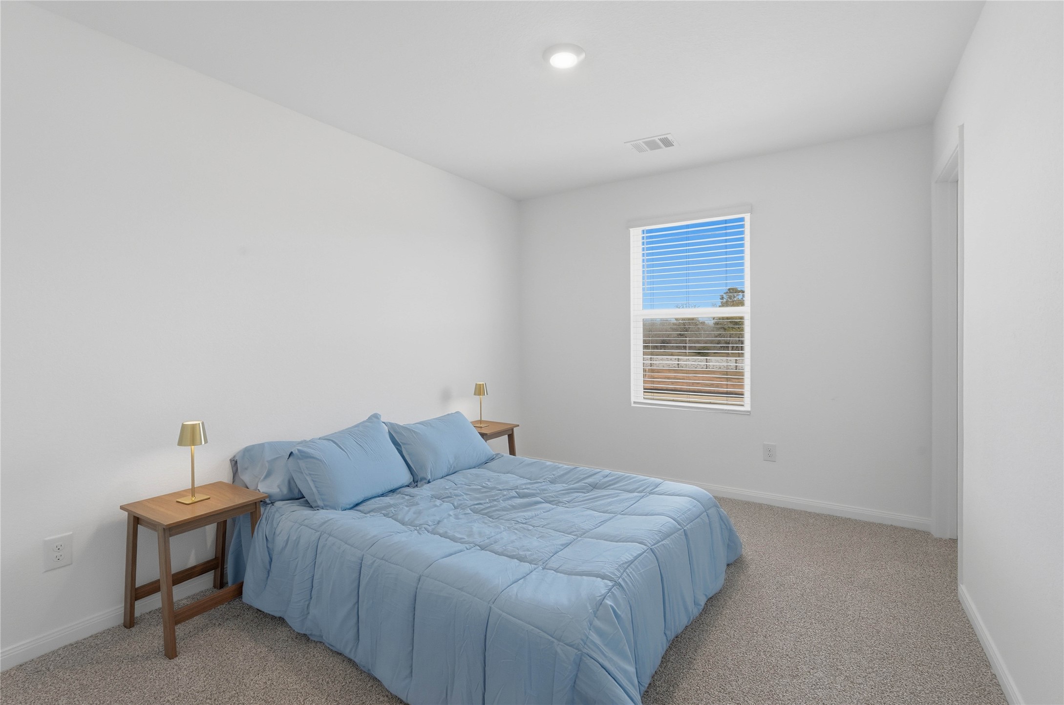 12366 Sword Point Court Willis, TX 77378 - Photo 13 of 21 Primary bedroom