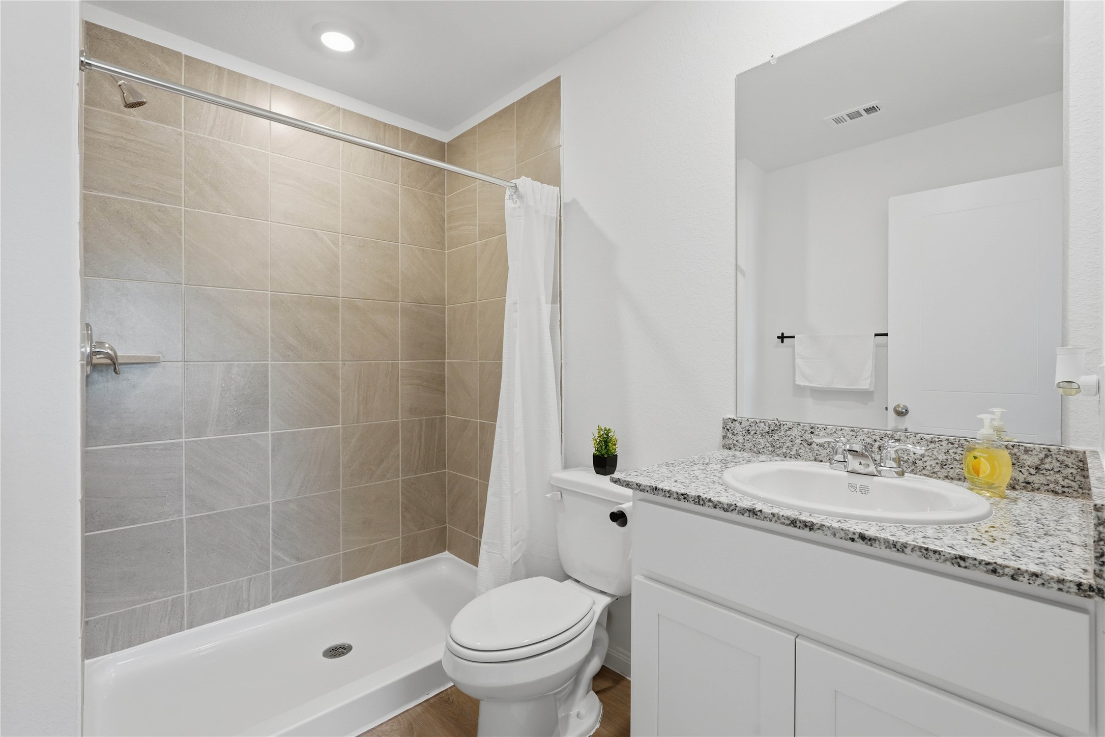 12366 Sword Point Court Willis, TX 77378 - Photo 15 of 21 En-suite primary bedroom