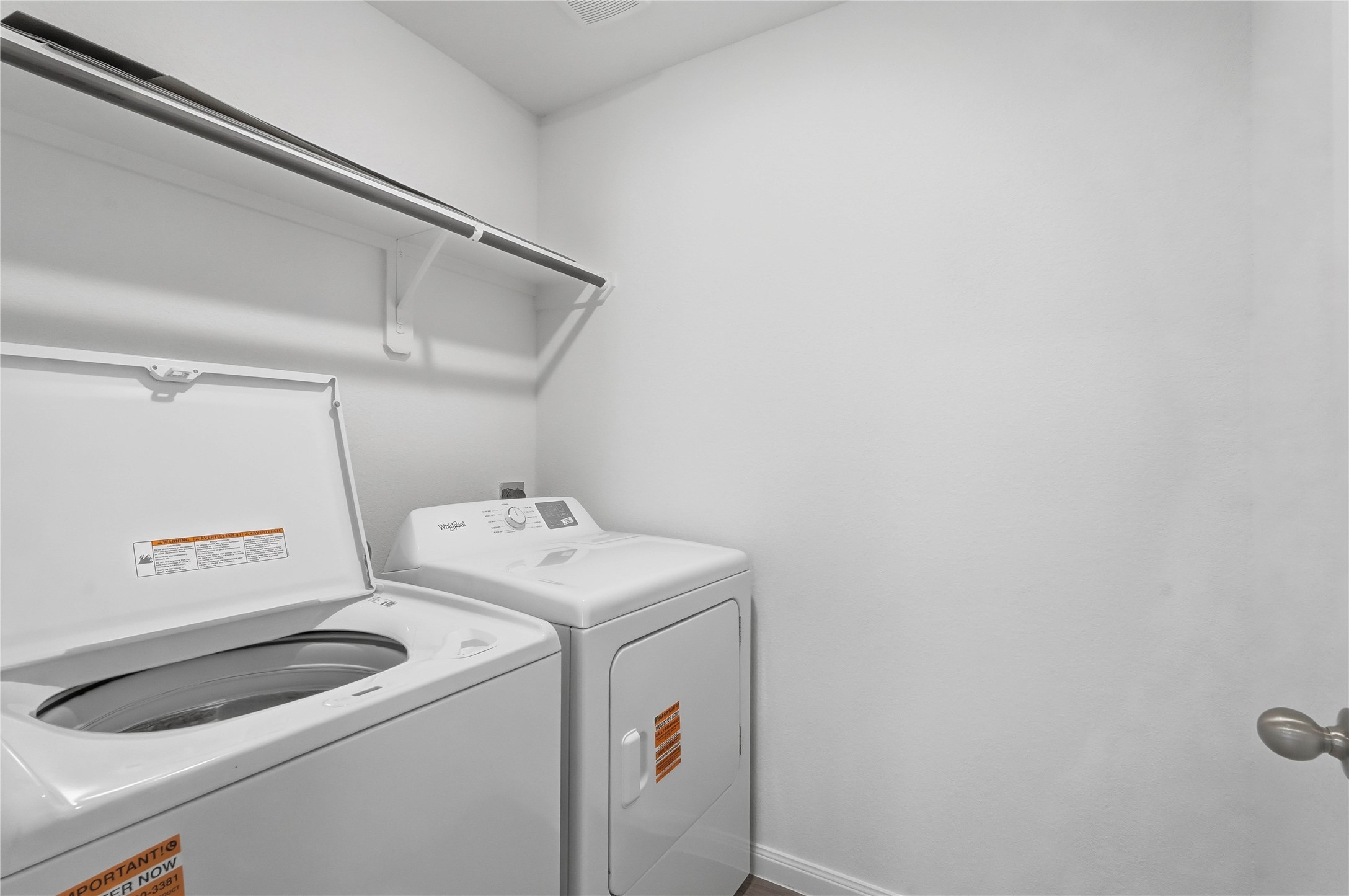 12366 Sword Point Court Willis, TX 77378 - Photo 19 of 21 Utility room located upstairs, convenient to the bedrooms