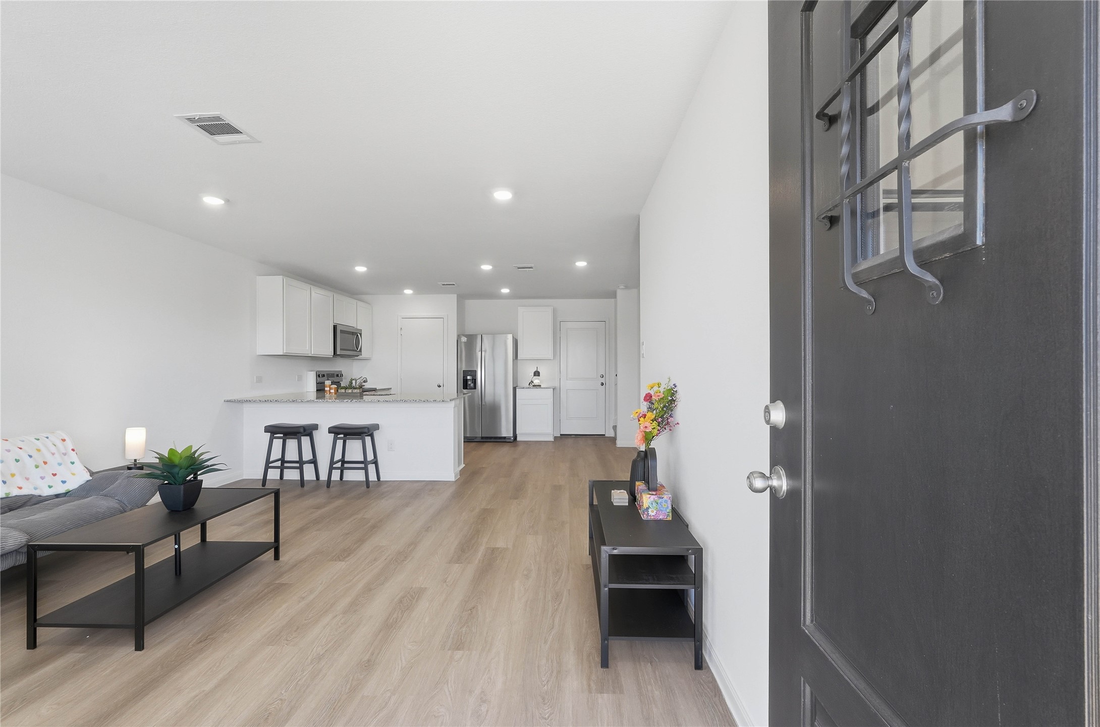 12366 Sword Point Court Willis, TX 77378 - Photo 3 of 21 Step right inside to living