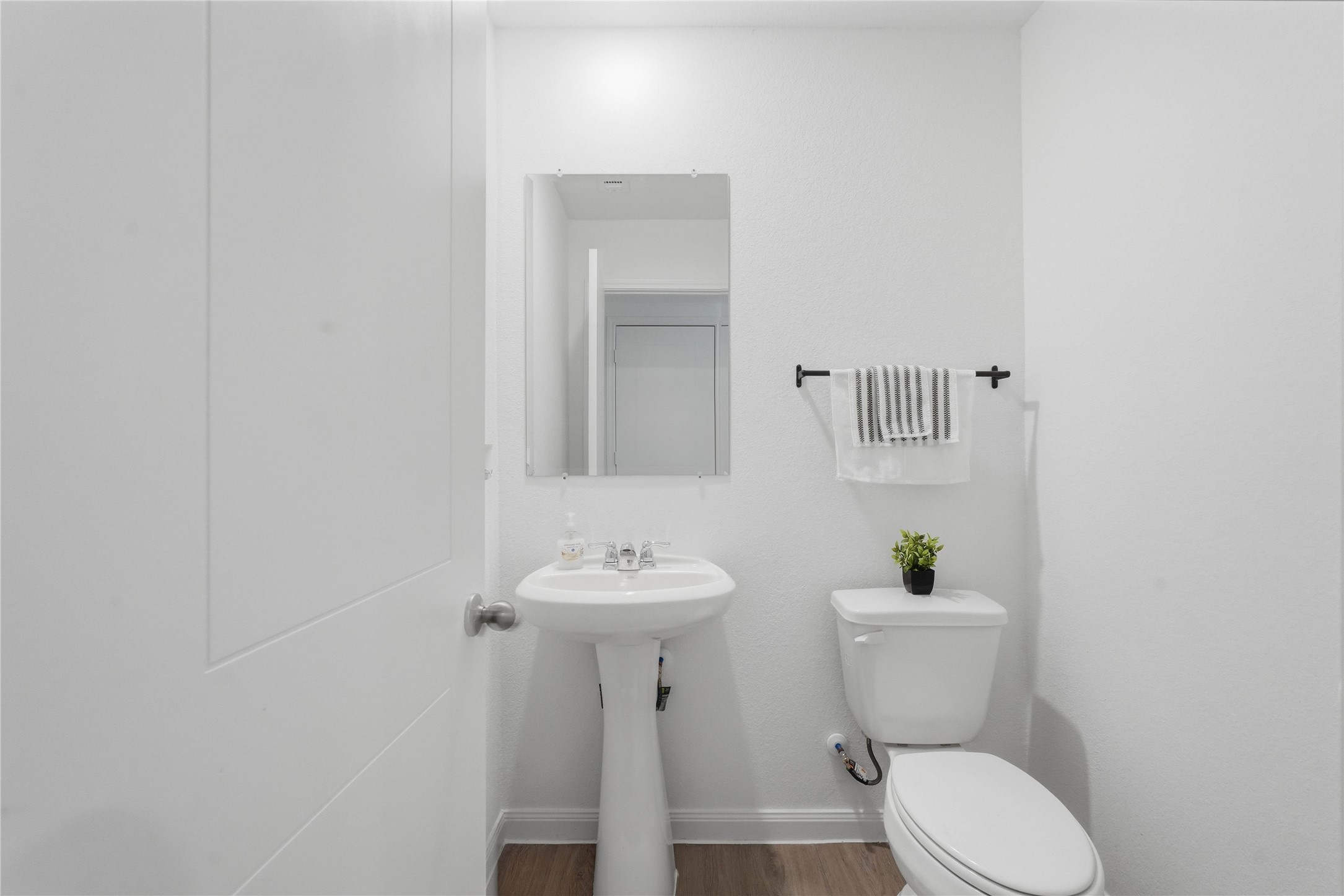 12366 Sword Point Court Willis, TX 77378 - Photo 8 of 21 Downstairs half bath