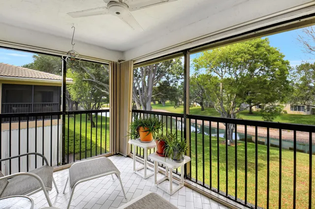 a view of a yard in front of house with a yard