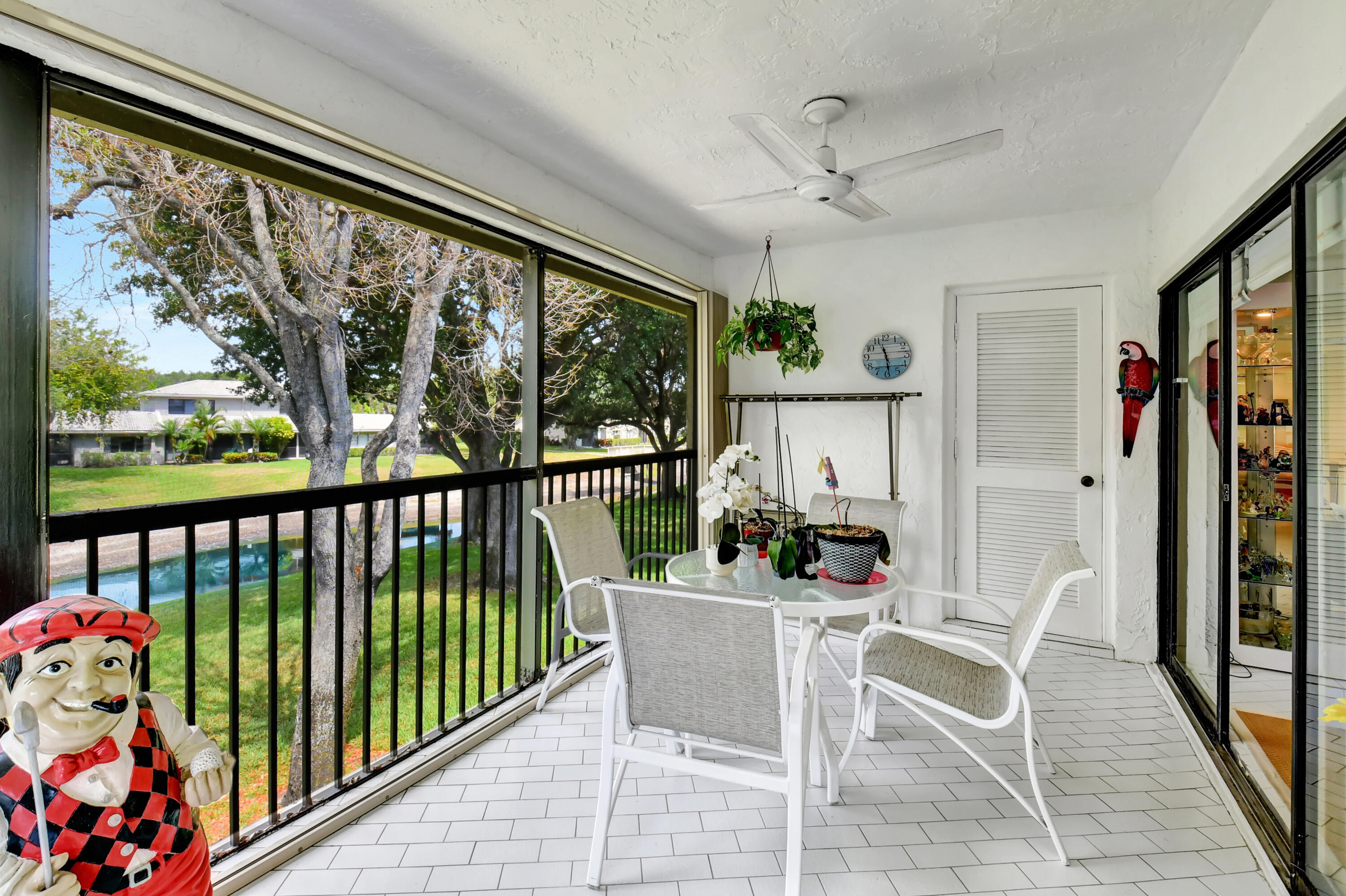 15 Stratford Drive, Unit B Boynton Beach, FL 33436 - Photo 25 of 84 a view of a dining room with furniture window and outside view