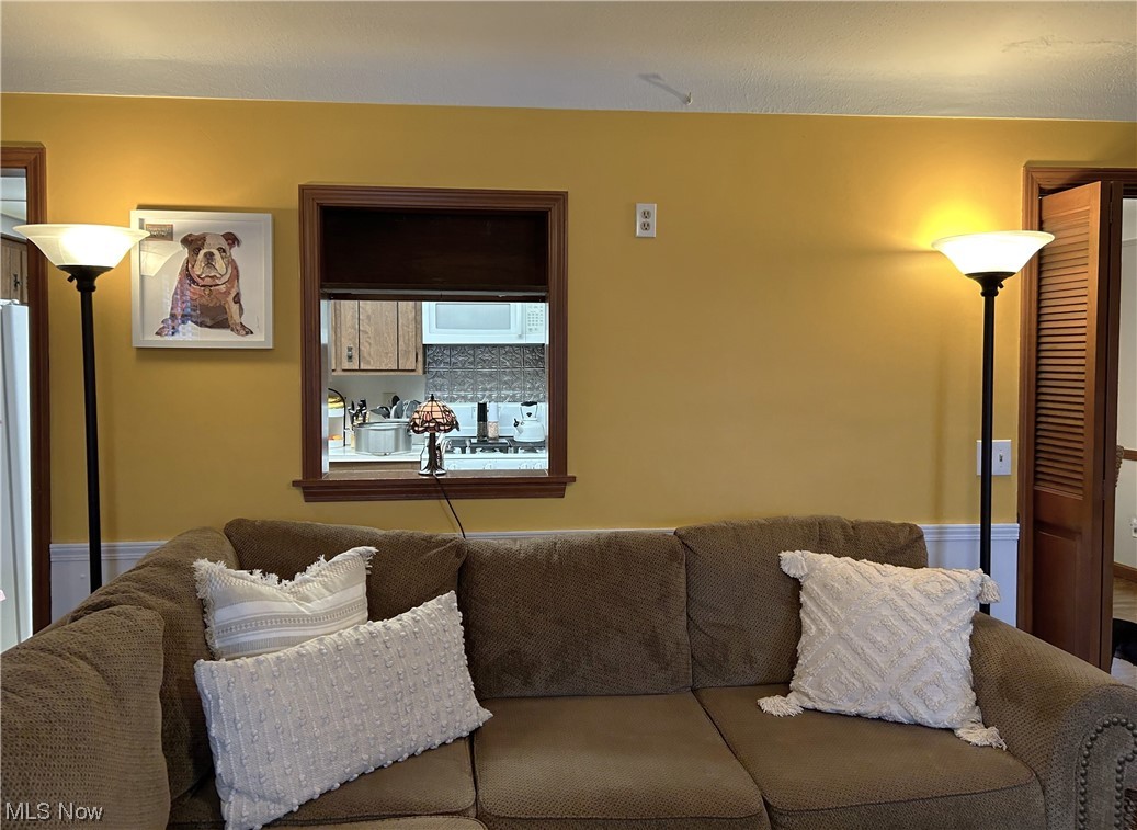 1748 Sunview Road Lyndhurst, OH 44124 - Photo 10 of 41 Pass through window to Kitchen from the Family Room