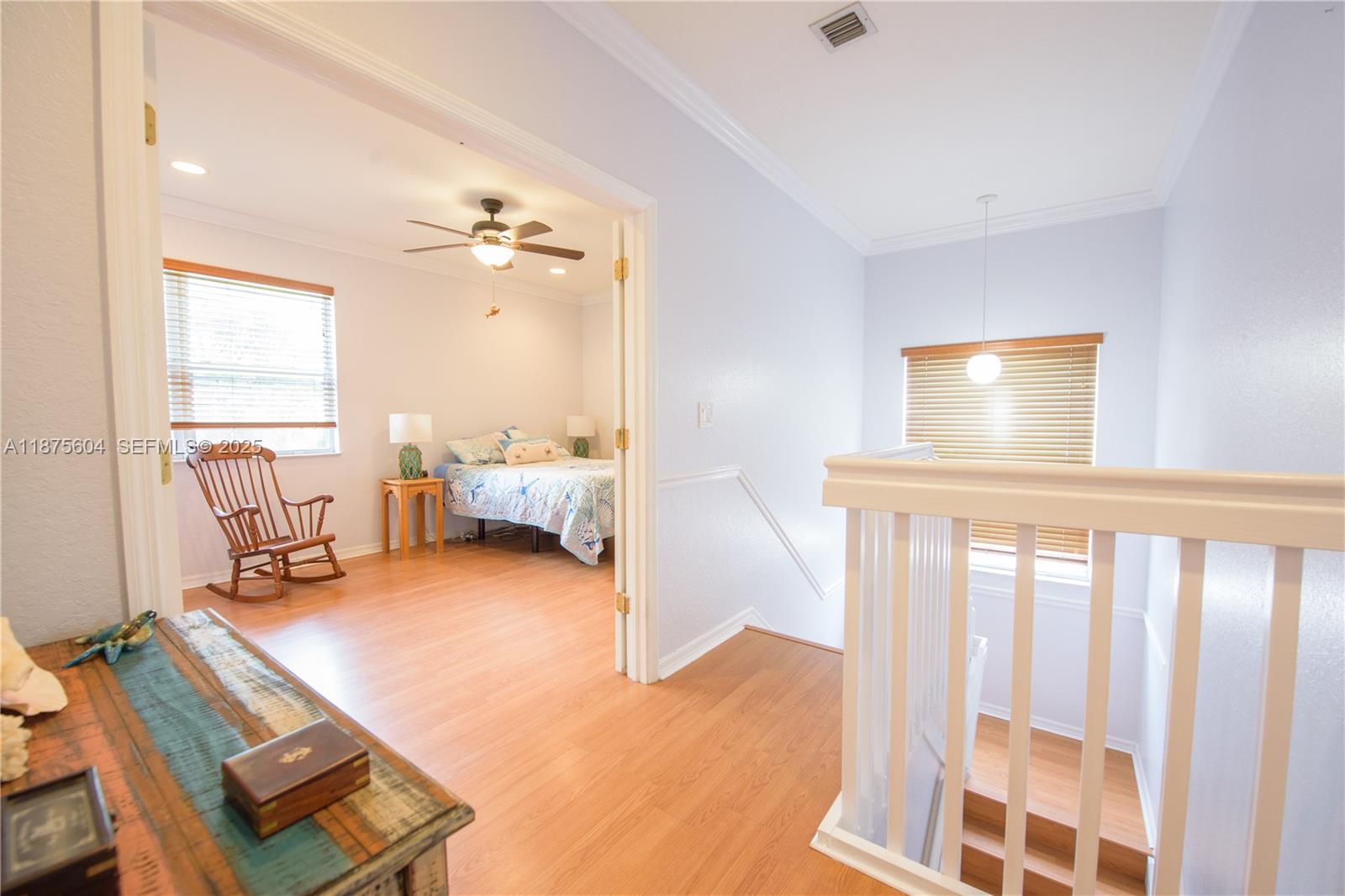 1316 Southeast 18th Terrace Homestead, FL 33035 - Photo 12 of 29 a bedroom with furniture and a window