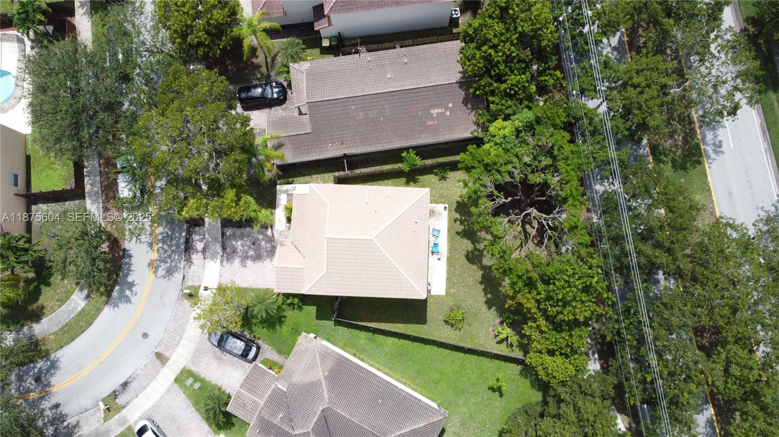 1316 Southeast 18th Terrace Homestead, FL 33035 - Photo 28 of 29 an aerial view of a house with a yard and a large tree