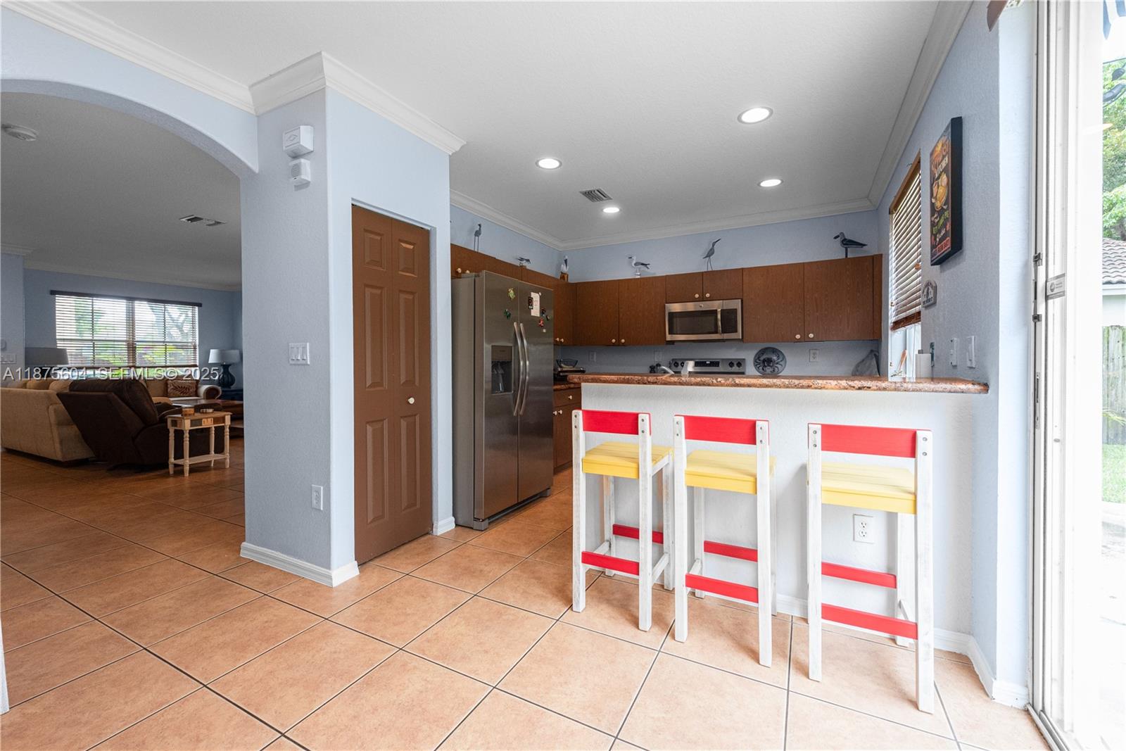 1316 Southeast 18th Terrace Homestead, FL 33035 - Photo 5 of 29 a room with furniture and utility room