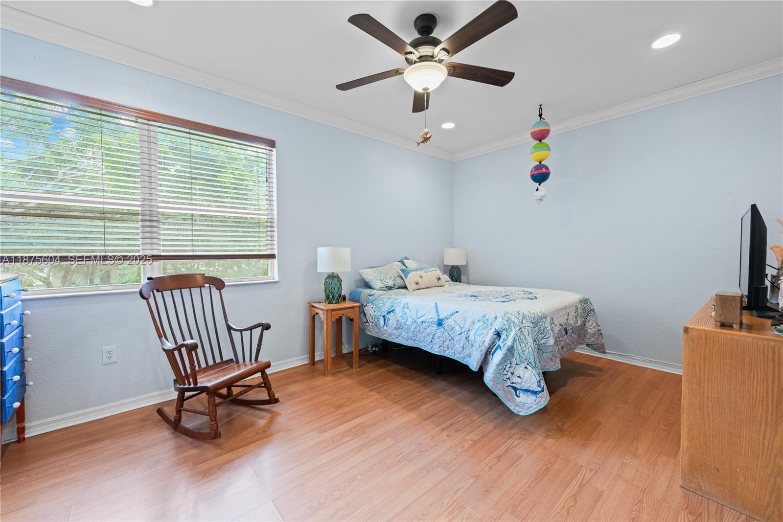 1316 Southeast 18th Terrace Homestead, FL 33035 - Photo 8 of 29 a bedroom with a bed and a window