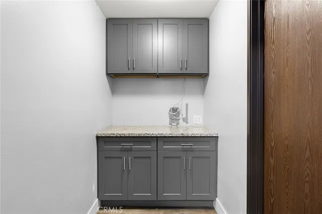 a view of an empty room with walk in closet