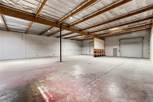 an aerial view of residential houses and outdoor space