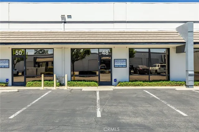 a view of a building with a street