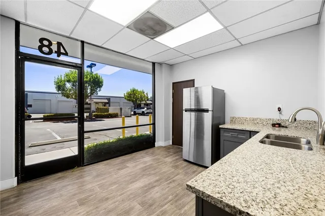 a view of a living room and a balcony