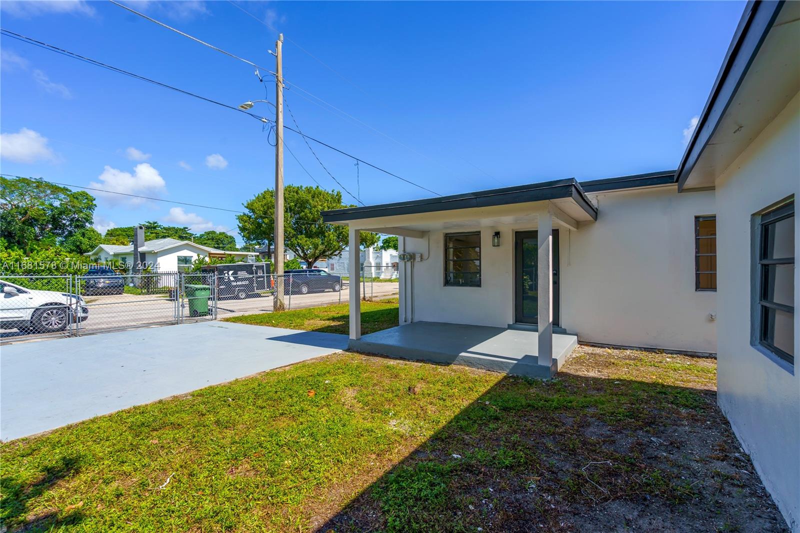 1400 Northwest 55th Street Miami, FL 33142 - Photo 17 of 33 a view of a house with backyard porch and sitting area