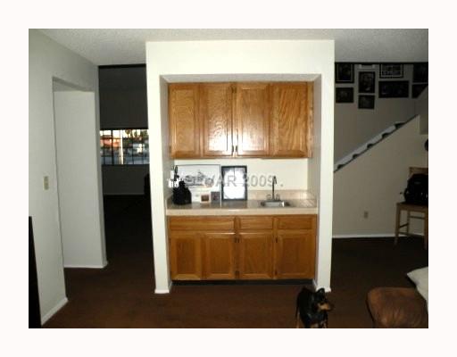 5518 West Viking Road Las Vegas, NV 89103 - Photo 11 of 12 Den. Wet bar in family room