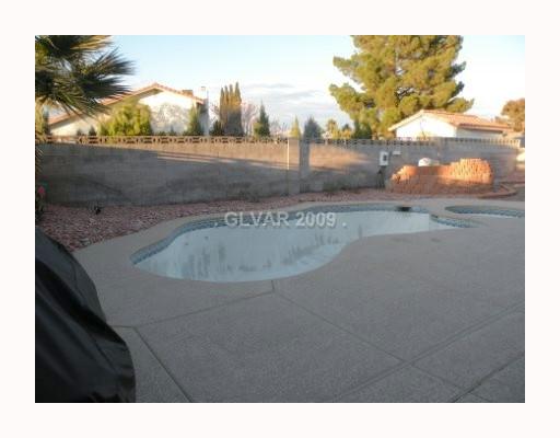 5518 West Viking Road Las Vegas, NV 89103 - Photo 2 of 12 Swimming Pool/Hot Tub/Sauna. Giant pool and spa 2 years old, large deck area, easy care landscaping.