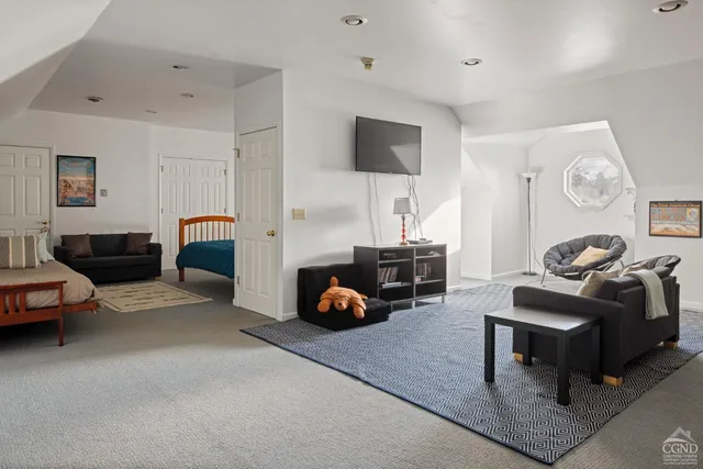 a living room with furniture and window