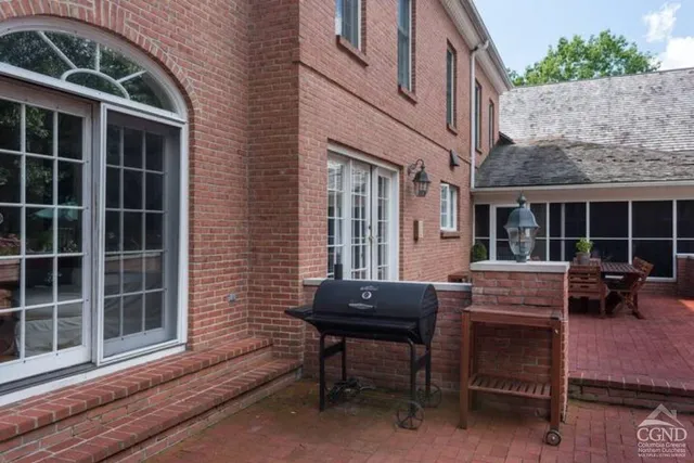 a very nice looking bedroom with furniture and a rug