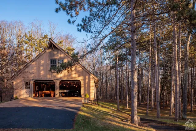 a view of street with large windows