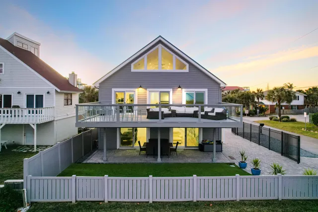 a swimming pool with wooden fence