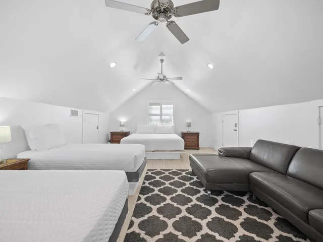 a view of a balcony with wooden floor
