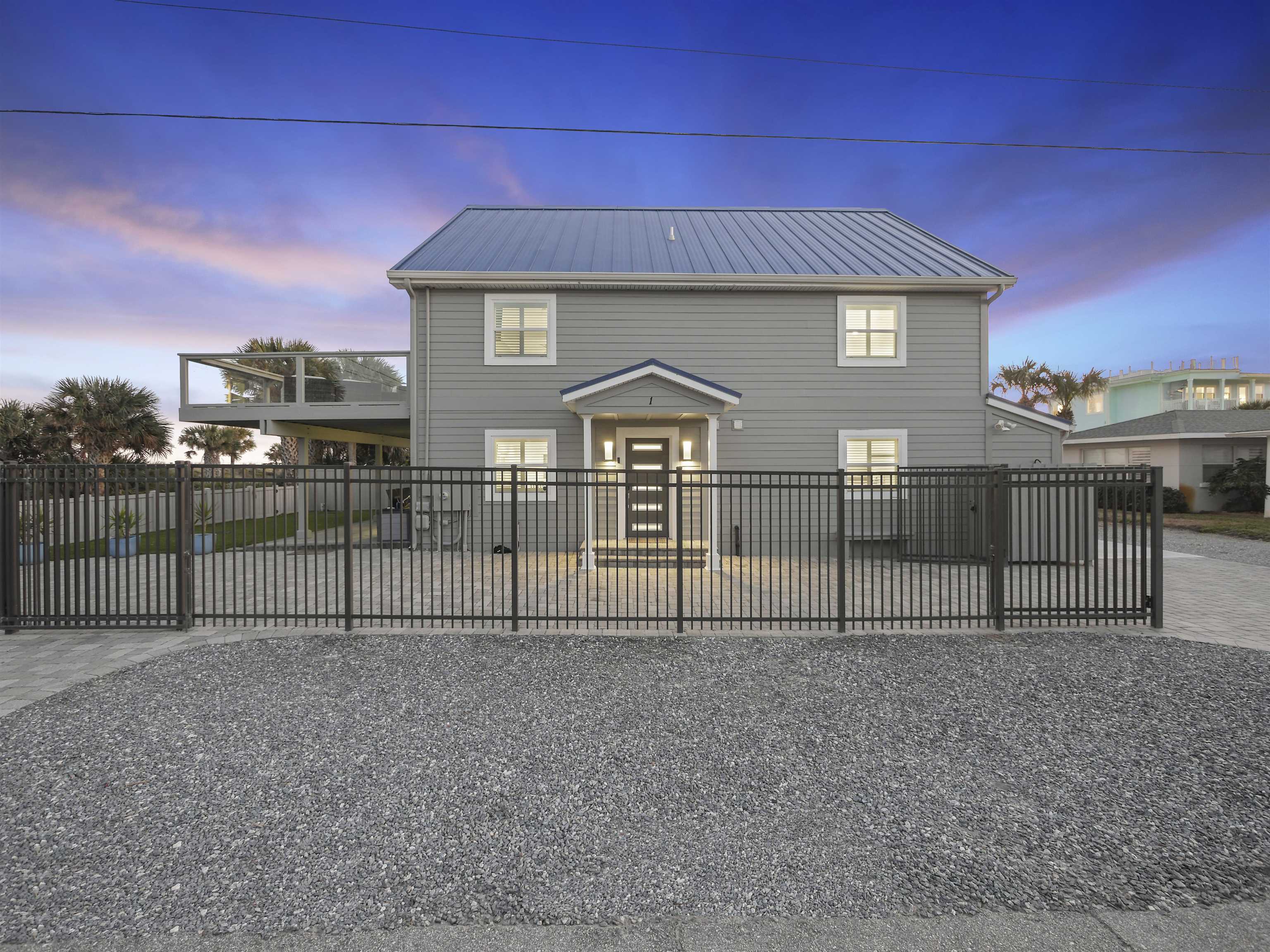 1 E Street St. Augustine, FL 32080 - Photo 45 of 54 a view of a house with iron fence