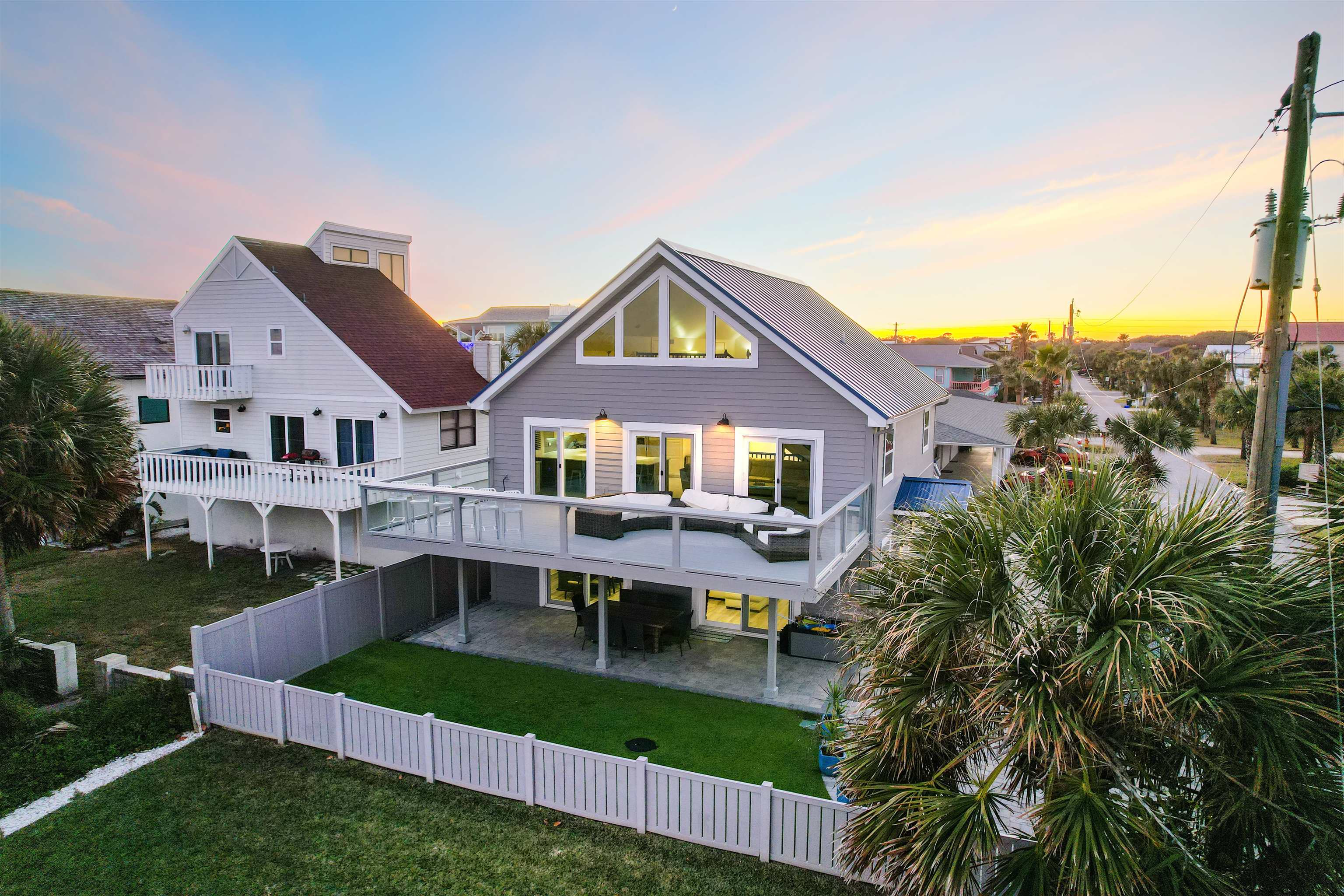 1 E Street St. Augustine, FL 32080 - Photo 47 of 54 a front view of house with yard and outdoor seating