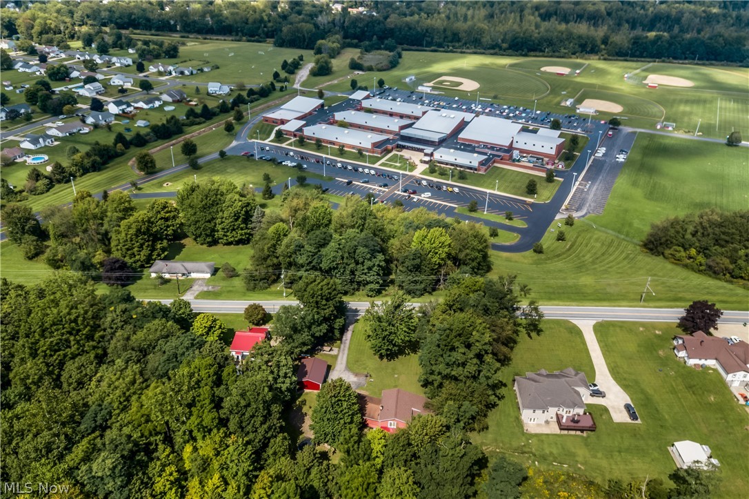 4922 South Ridge Road East Geneva, OH 44041 - Photo 45 of 46 Broad aerial view showcasing the property’s prime position directly across from Geneva High School and its athletic fields.