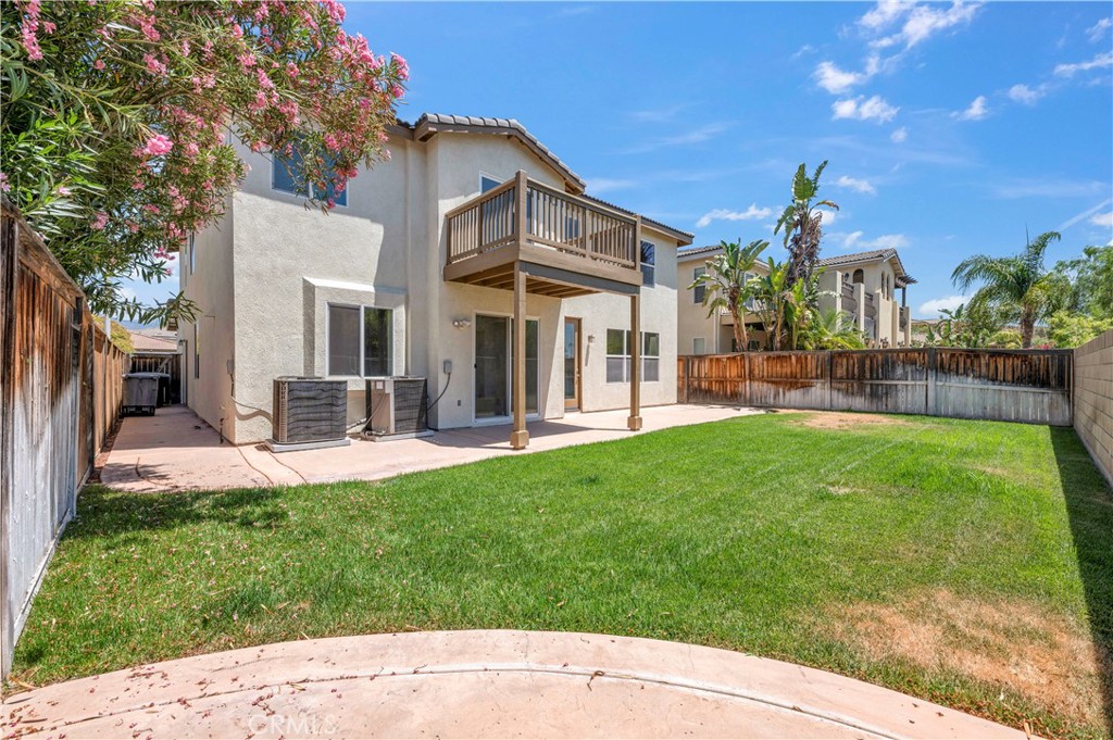 1984 Bronte Road San Jacinto, CA 92583 - Photo 30 of 30 a view of a house with a yard porch and sitting area