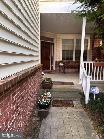 a outdoor space with patio furniture and a potted plant