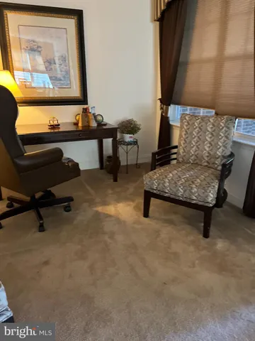 a workspace with furniture and a couch