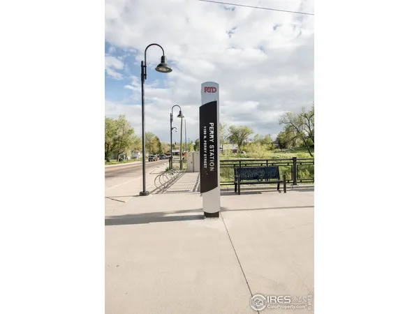 a sign that is sitting in front of a building