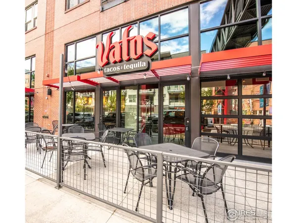 a cafe on the corner of the street