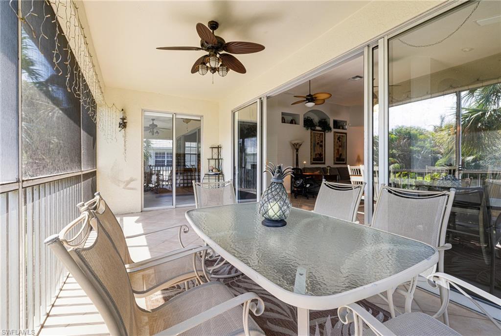 19081 Ridgepoint Drive, Unit 201 Estero, FL 33928 - Photo 32 of 50 a dining room with furniture and a large window