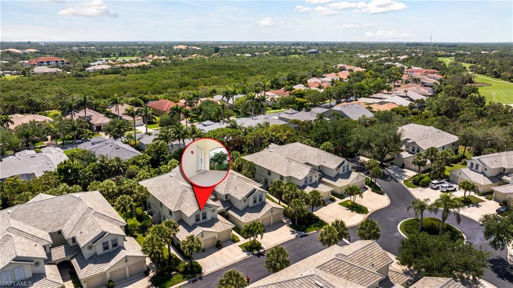 19081 Ridgepoint Drive, Unit 201 Estero, FL 33928 - Photo 40 of 50 an aerial view of residential house with outdoor space
